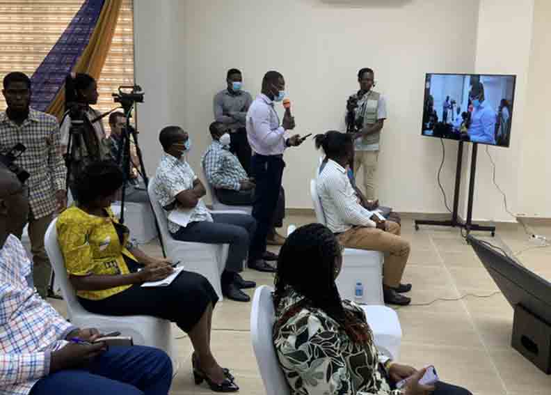 A journalist makes an intervention during the Q&A session